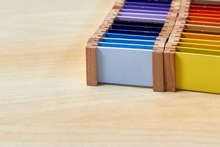Montessori color tablets arranged in their wooden box